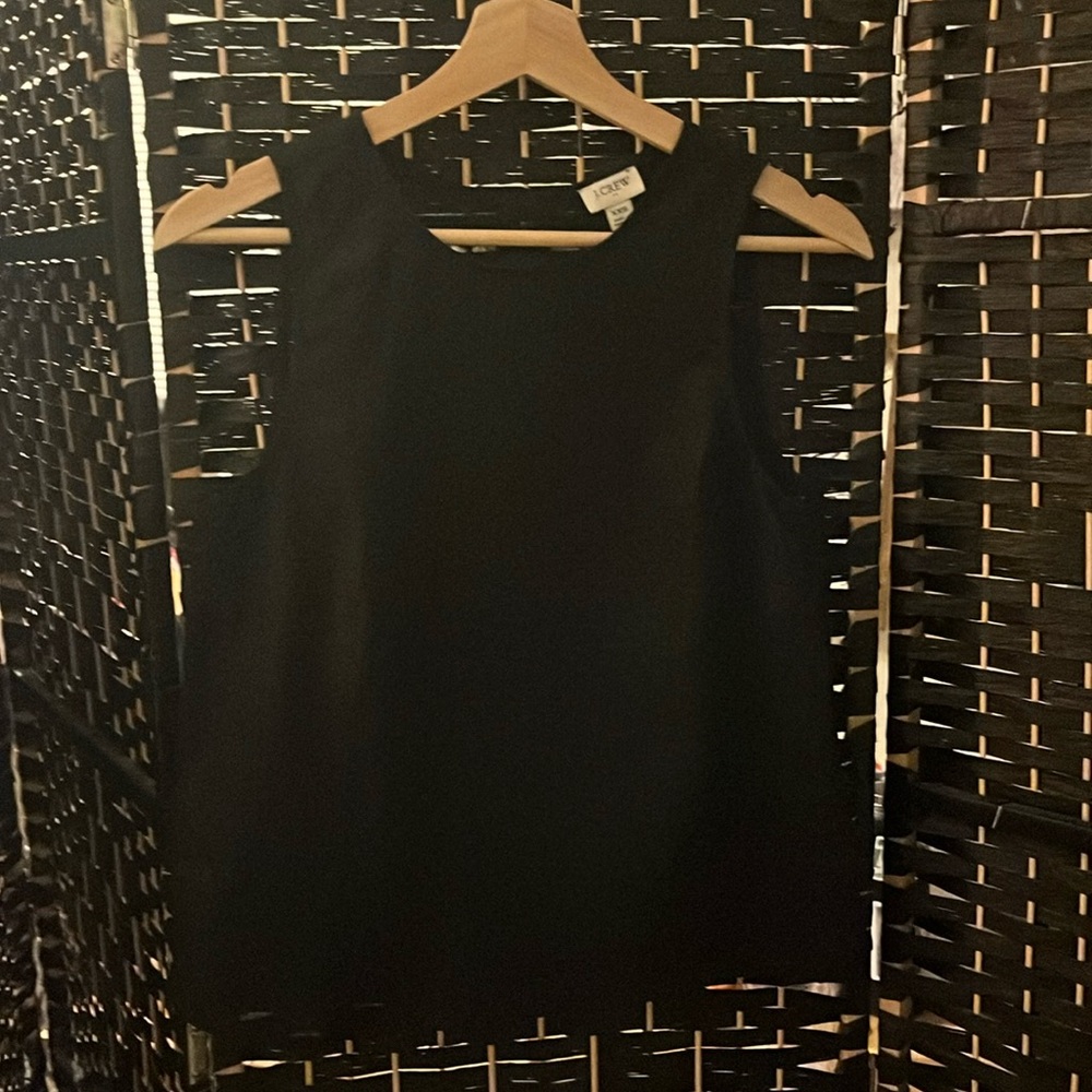 Jcrew linen shell with button back.